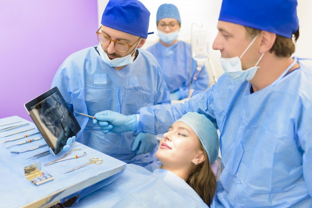 dentists with their patient