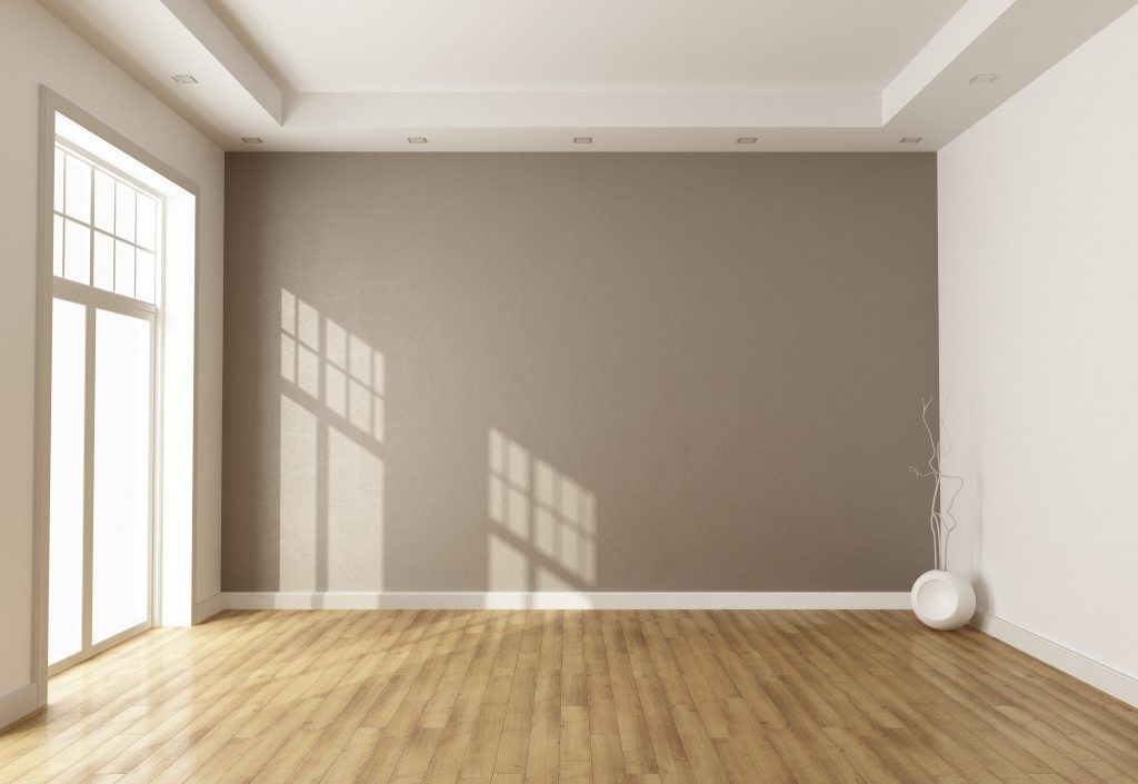 Empty room with beige wall