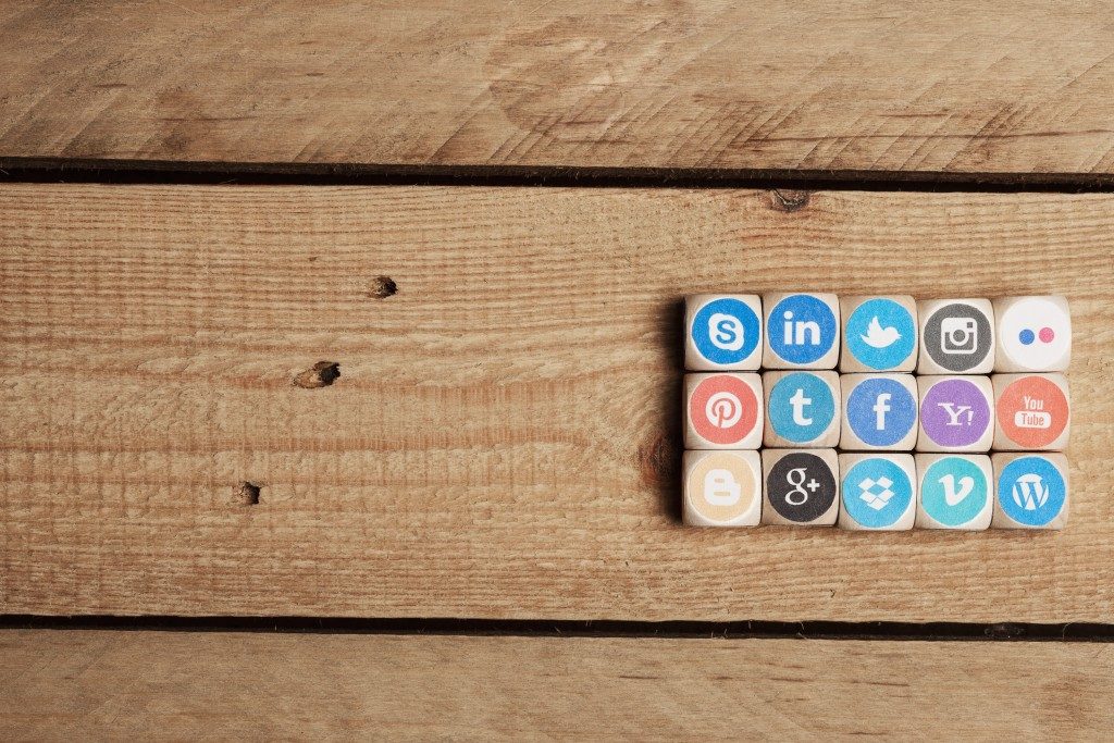 social media sites on wood blocks