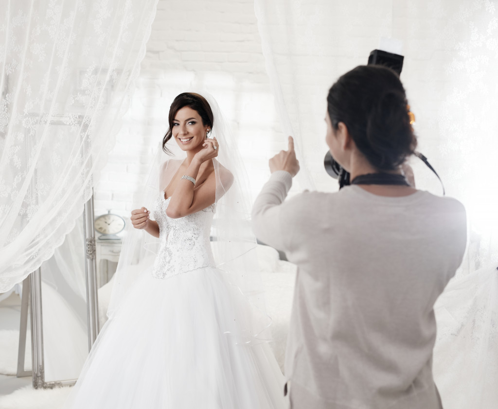bride getting photographed
